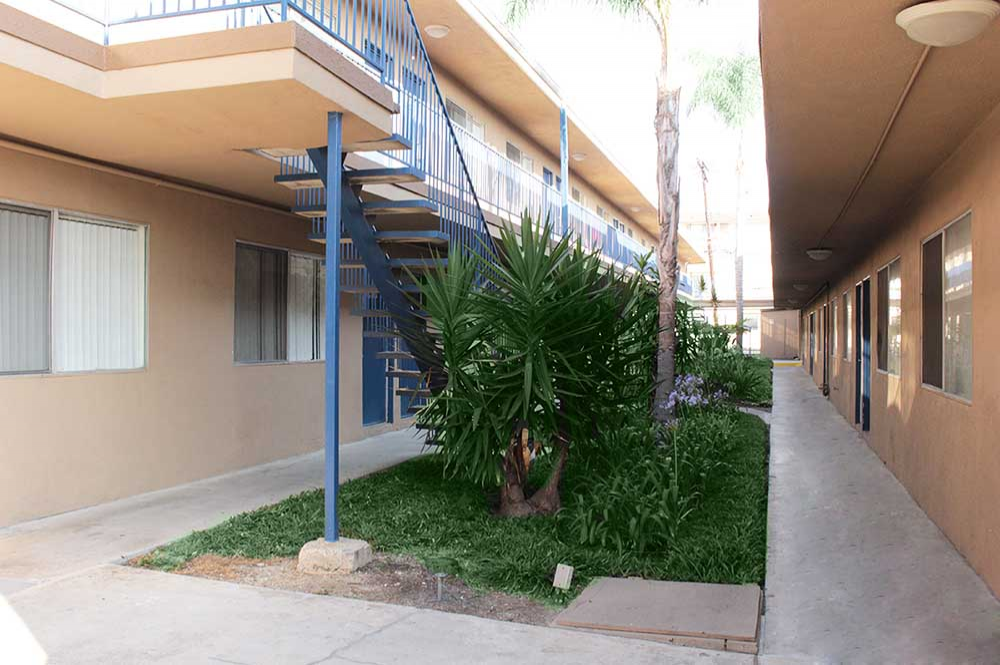 This Outside 4 photo can be viewed in person at the The Gondolier Apartments, so make a reservation and stop in today.